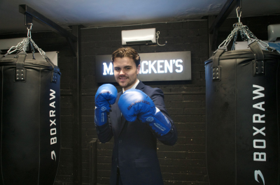 Law firm steps up to support its future boxing star